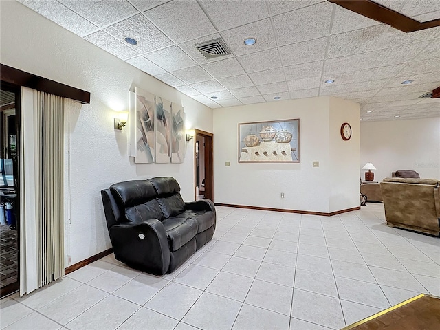 interior space featuring a paneled ceiling