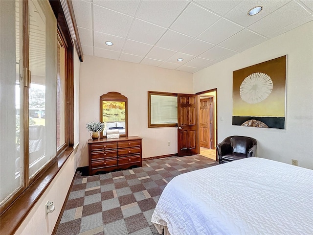 bedroom featuring a paneled ceiling