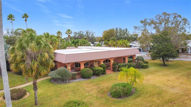 view of front of home with a front yard