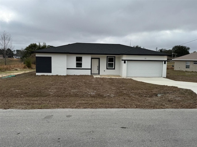 ranch-style home with a garage