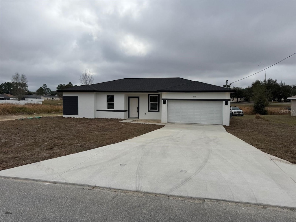 view of front of home featuring a garage