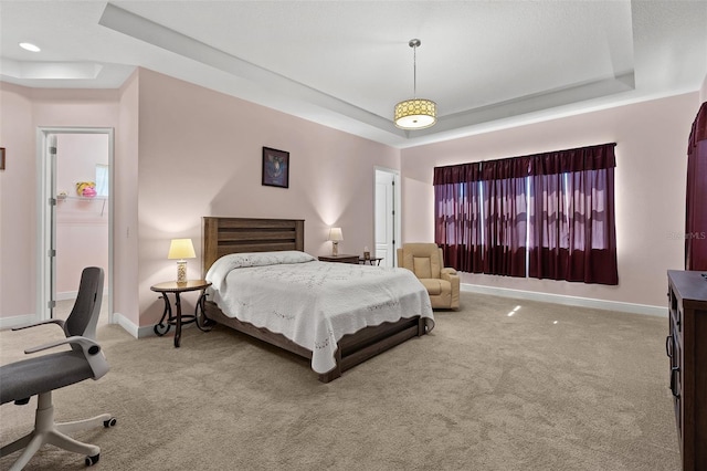 bedroom featuring carpet, a raised ceiling, baseboards, and recessed lighting