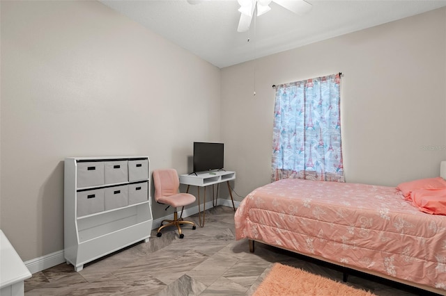 bedroom with baseboards and a ceiling fan