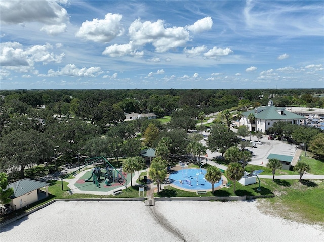 aerial view featuring a wooded view