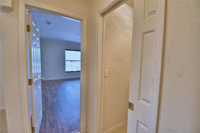 hall with light wood-type flooring