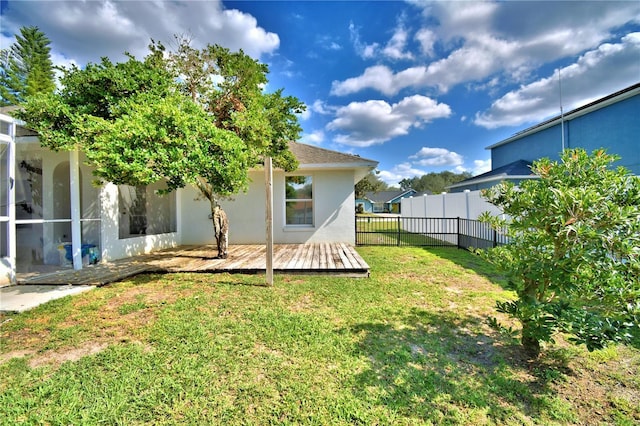 view of yard featuring a deck