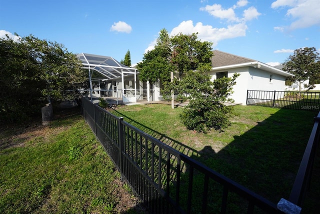 view of yard featuring a lanai