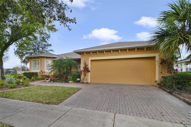 view of front of home featuring a garage