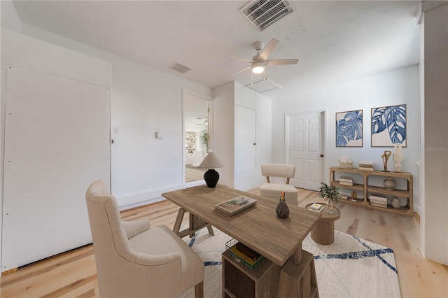 dining room featuring ceiling fan and light hardwood / wood-style floors