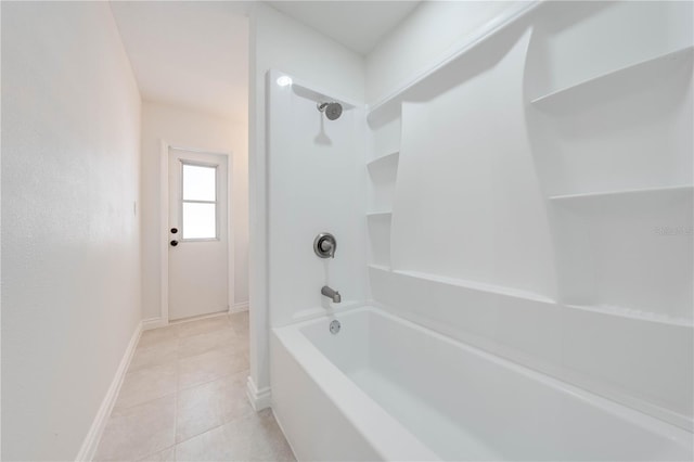 bathroom featuring tile patterned flooring and bathtub / shower combination