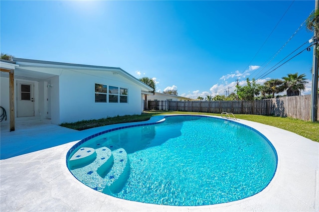 view of pool featuring a patio area