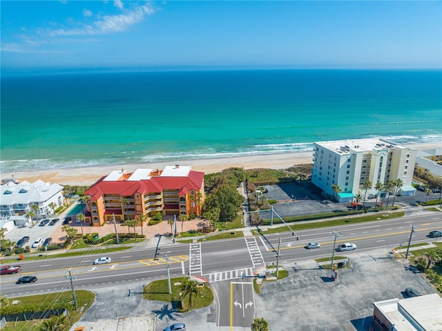 aerial view with a view of the beach and a water view