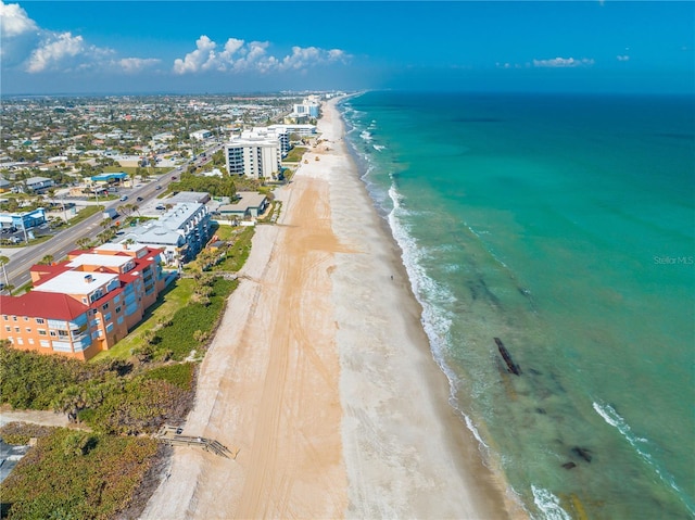 aerial view featuring a water view and a beach view