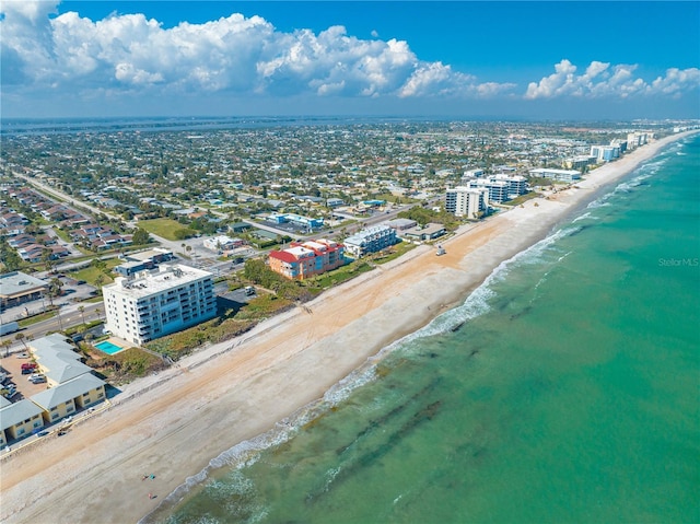 bird's eye view with a view of the beach and a water view