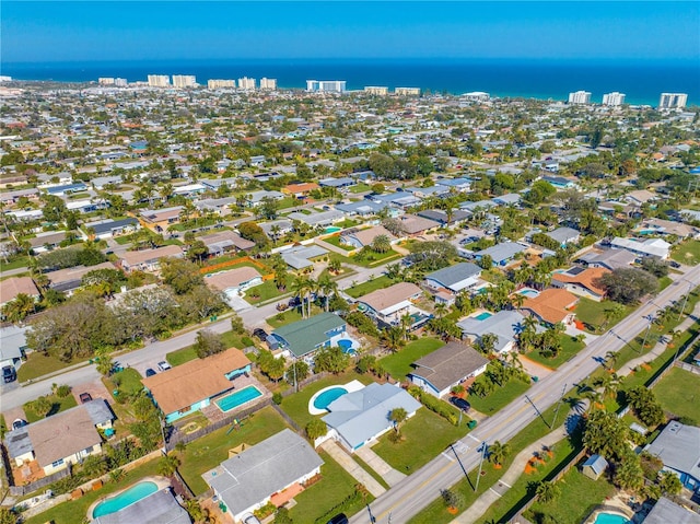 bird's eye view with a water view