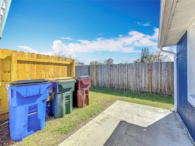 view of yard with a patio and a fenced backyard