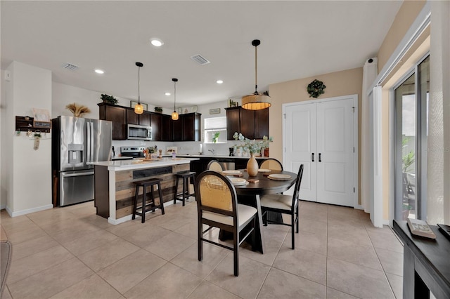 dining room with light tile patterned floors