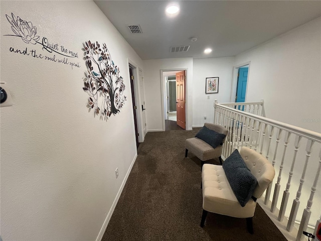 corridor featuring recessed lighting, baseboards, visible vents, and carpet flooring