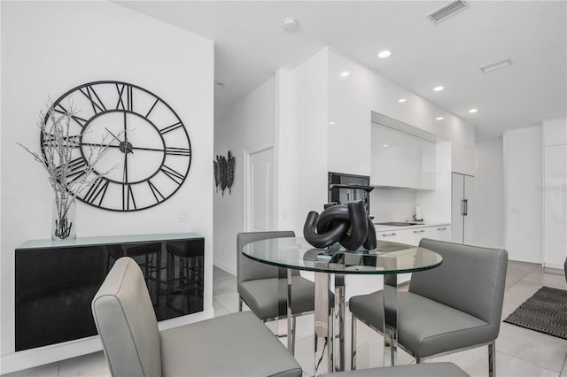 dining room with light tile patterned floors