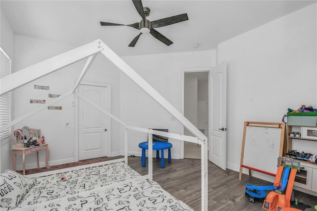 bedroom featuring wood-type flooring and ceiling fan