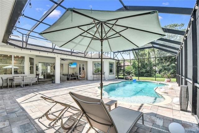 view of pool featuring an outdoor living space, a lanai, and a patio