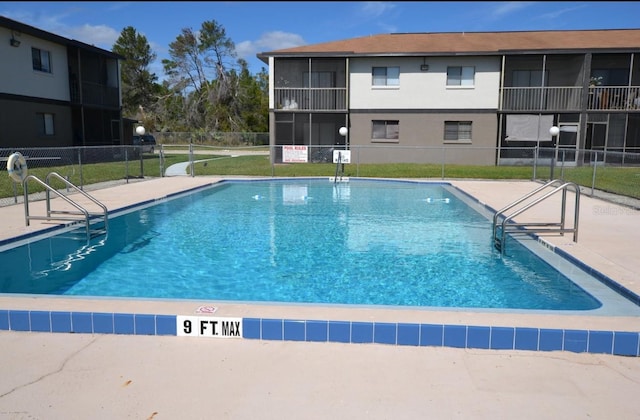 view of pool featuring a patio