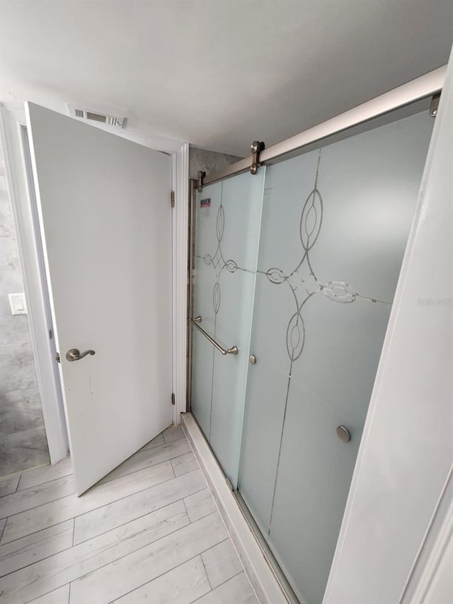 1804 University Ln Unit 308, Cocoa, FL 32922 - bathroom featuring wood finished floors
