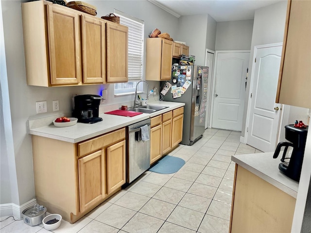 kitchen featuring appliances with stainless steel finishes, sink, light tile patterned floors, and light brown cabinetry