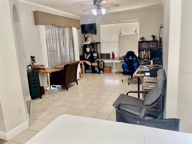 office area with crown molding, ceiling fan, and tile patterned floors