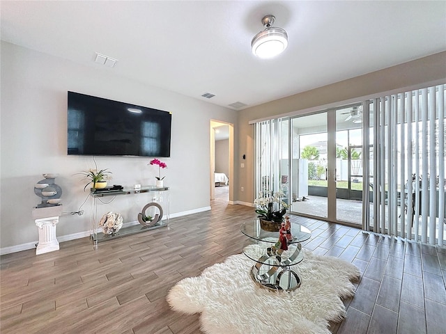 living room with wood-type flooring