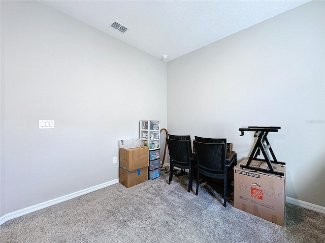 office area with dark colored carpet