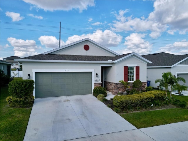 single story home featuring a garage