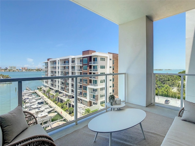 balcony featuring a water view