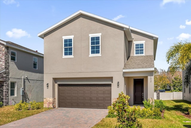 view of front of property featuring a garage