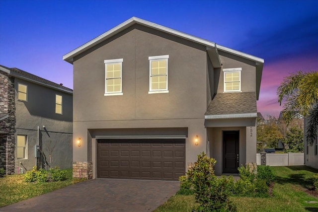 view of front of property featuring a garage