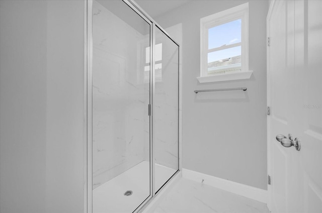 bathroom with an enclosed shower