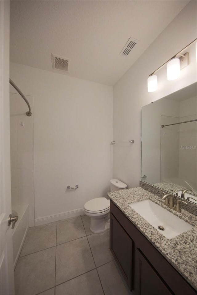 full bathroom with tile patterned flooring, vanity, bathtub / shower combination, and toilet