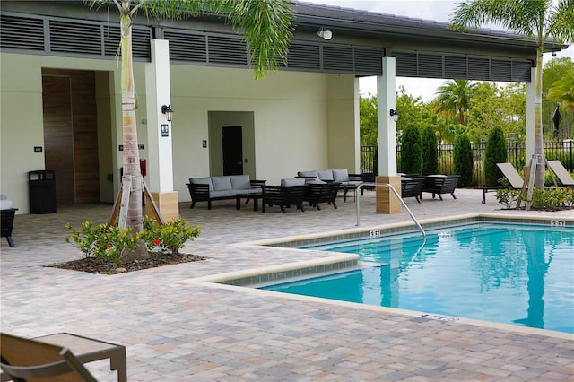 view of swimming pool with an outdoor hangout area and a patio area