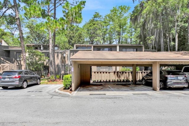 view of parking with a carport