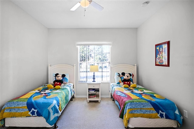 bedroom with ceiling fan and carpet