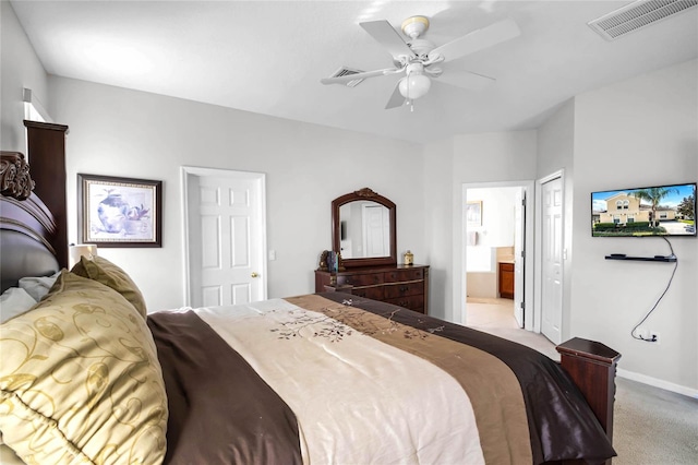 carpeted bedroom featuring ceiling fan and connected bathroom