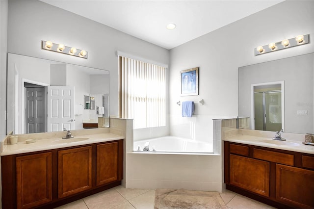 bathroom featuring tile patterned floors, plus walk in shower, and vanity