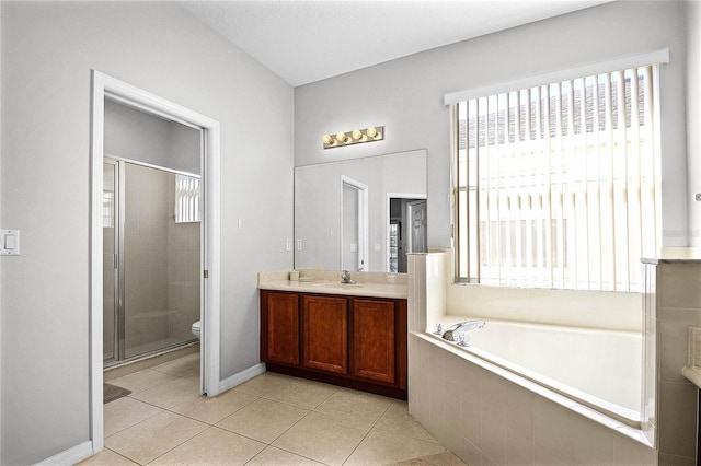 full bathroom with tile patterned flooring, toilet, vanity, and plus walk in shower