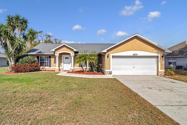 ranch-style house featuring a garage and a front yard