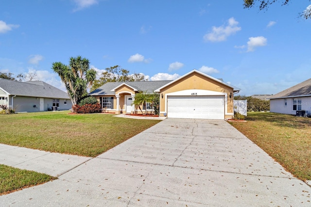 ranch-style home featuring a garage and a front yard