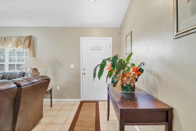 foyer with light tile patterned flooring