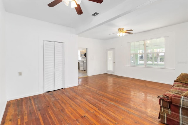 unfurnished living room with hardwood / wood-style floors and ceiling fan