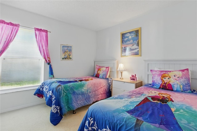 8595 Sunrise Key Dr, Kissimmee, FL 34747 - bedroom featuring carpet and baseboards