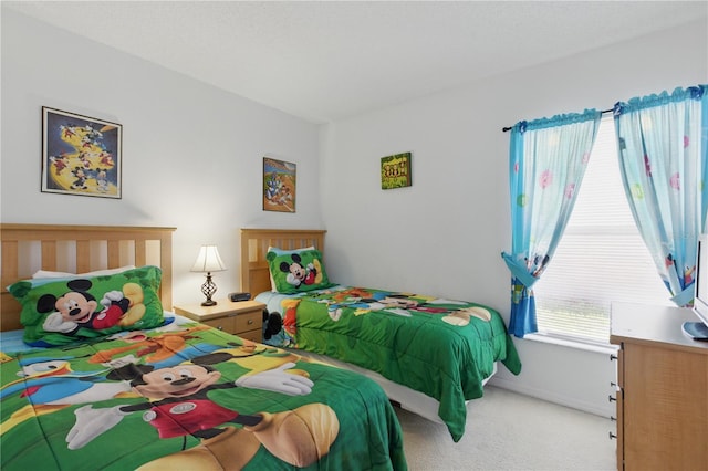 8595 Sunrise Key Dr, Kissimmee, FL 34747 - bedroom with light carpet and baseboards