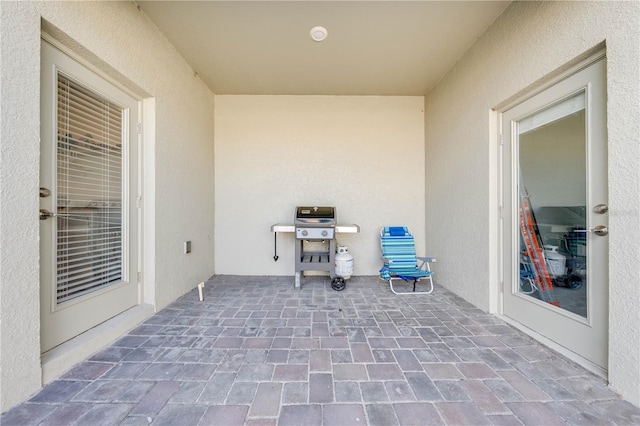 view of patio with a grill